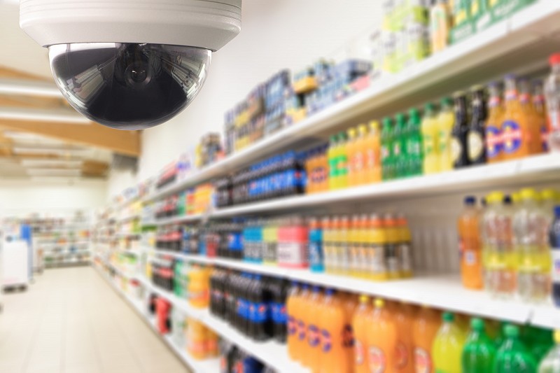 CCTV camera in retail grocery aisle